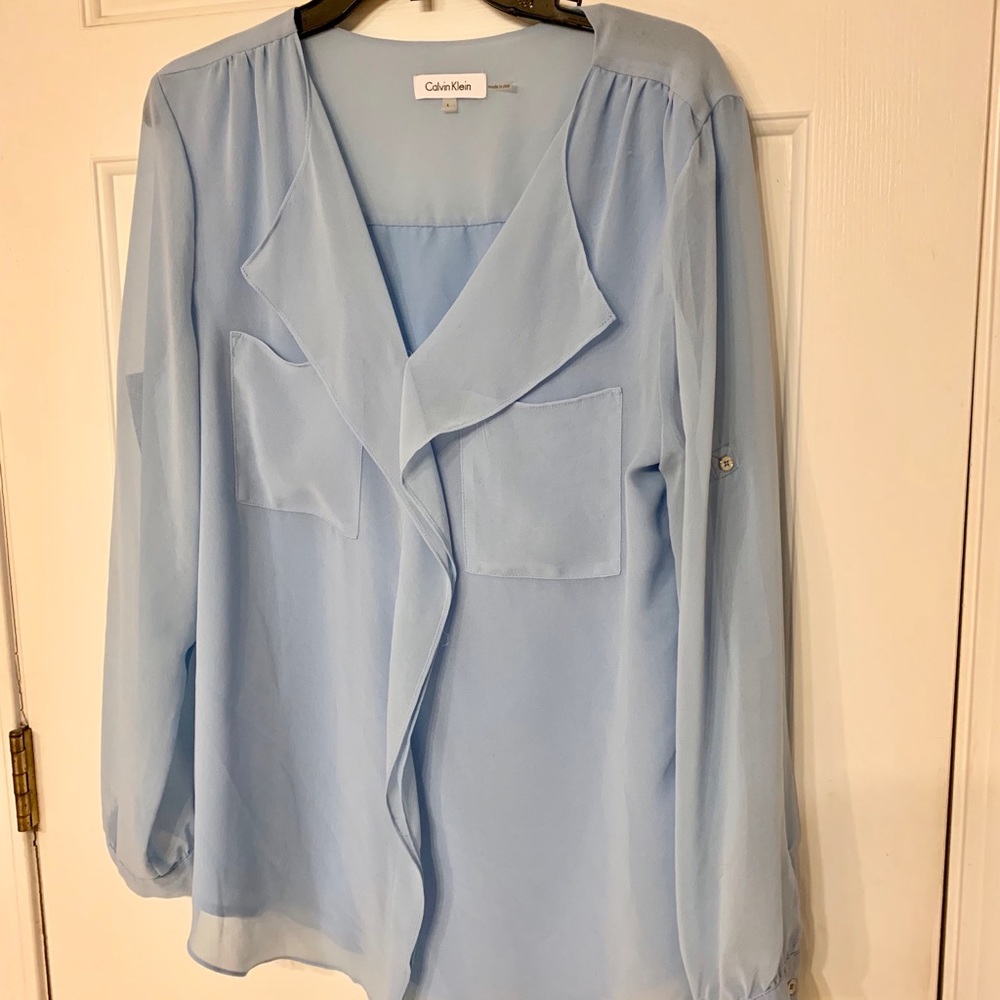 Calvin Klein large flowy light blue blouse large